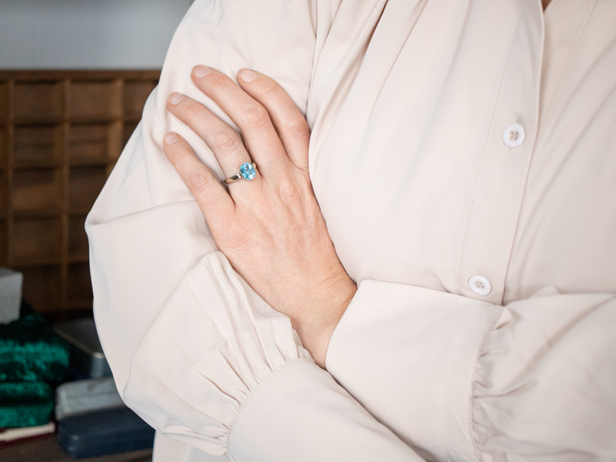 Twinkling White Gold Blue Topaz and Diamond Ring