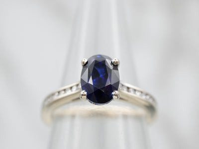 Polished Sapphire Engagement Ring with Diamond Accents