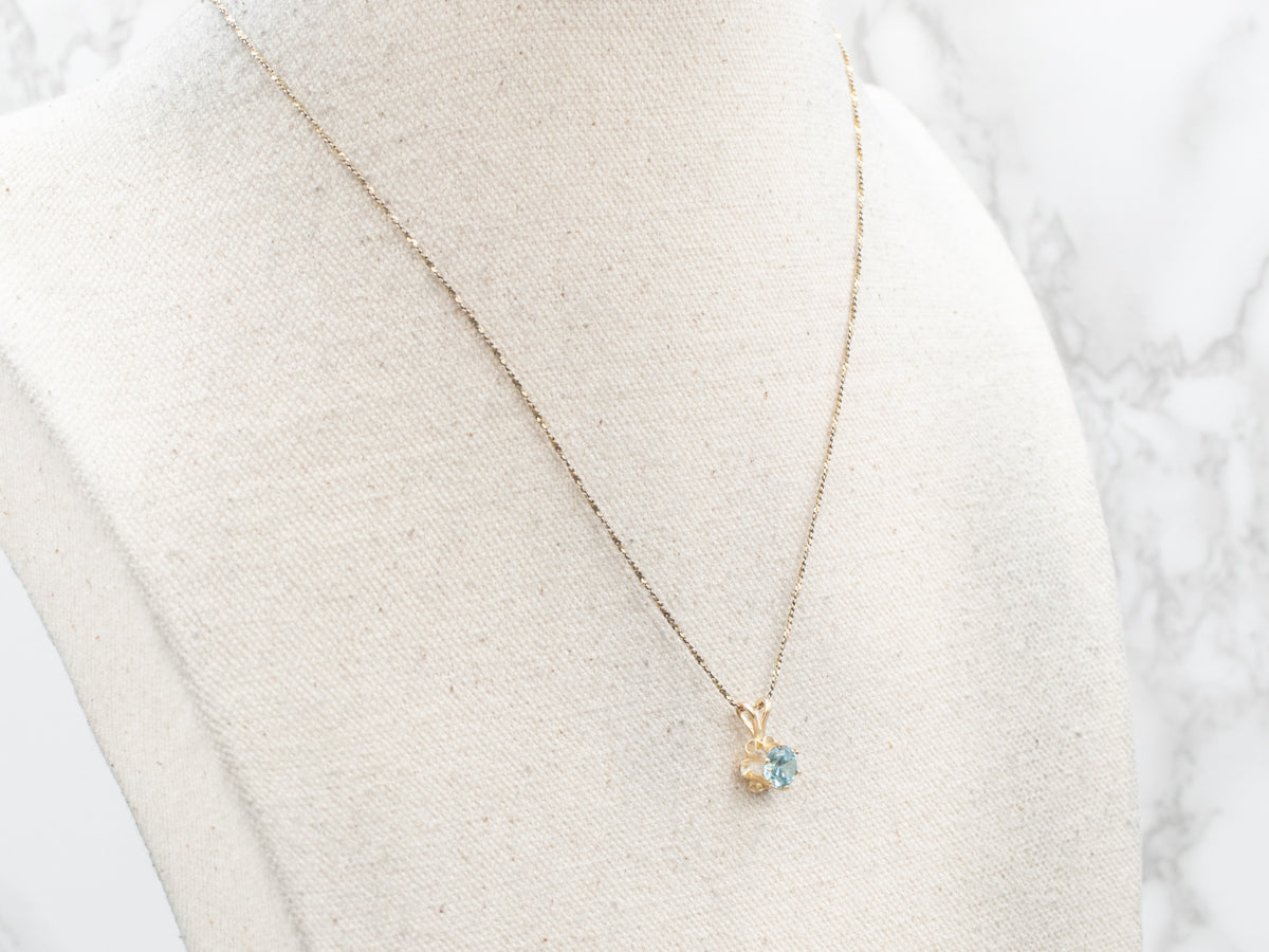 Blue Zircon Solitaire Buttercup Pendant