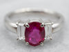 Vibrant Platinum Ruby and Emerald Cut Diamond Ring
