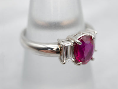 Vibrant Platinum Ruby and Emerald Cut Diamond Ring