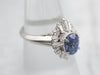 Lovely Platinum Sapphire Diamond Halo Ring