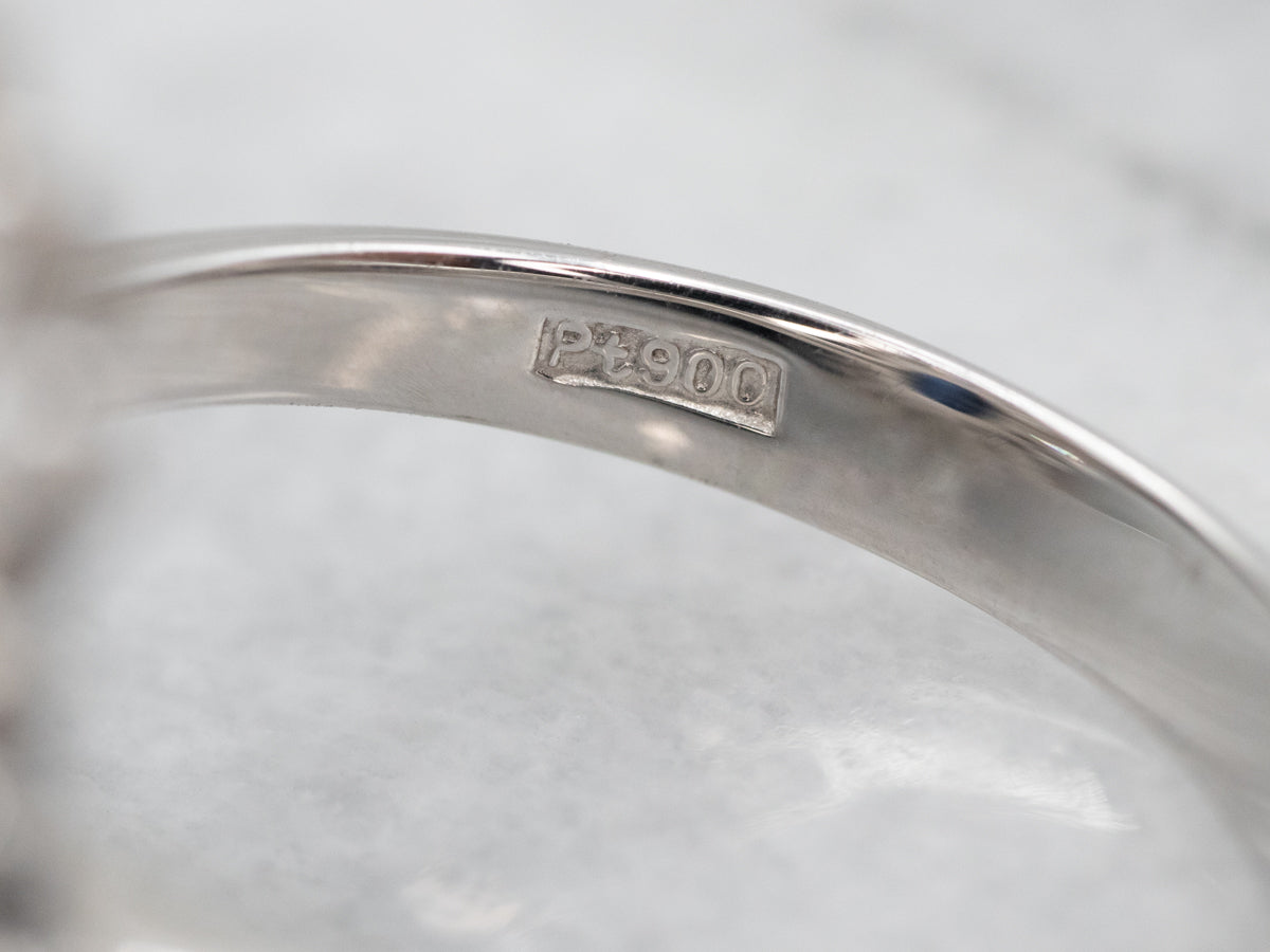 Stunning Platinum Sapphire and Diamond Halo Engagement Ring