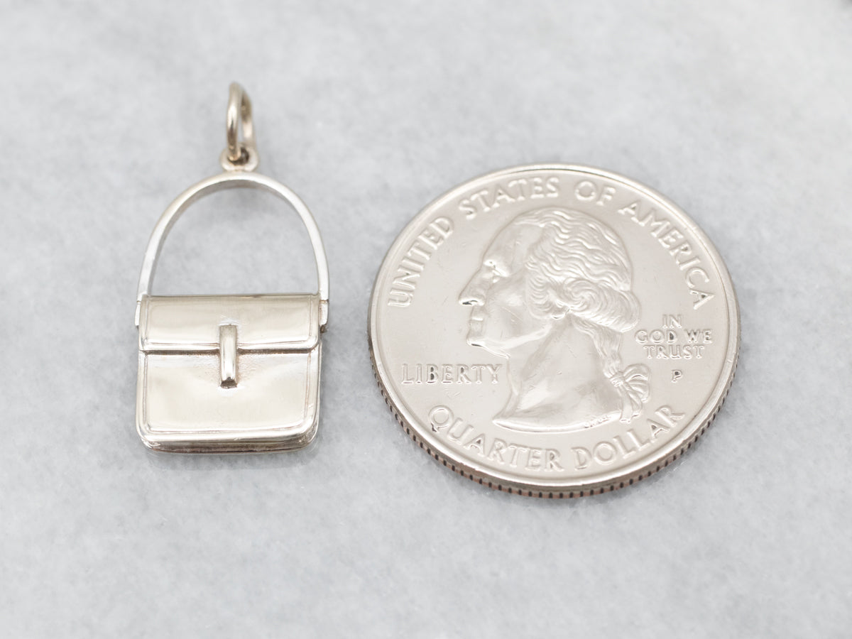Lindo colgante para bolso en oro blanco