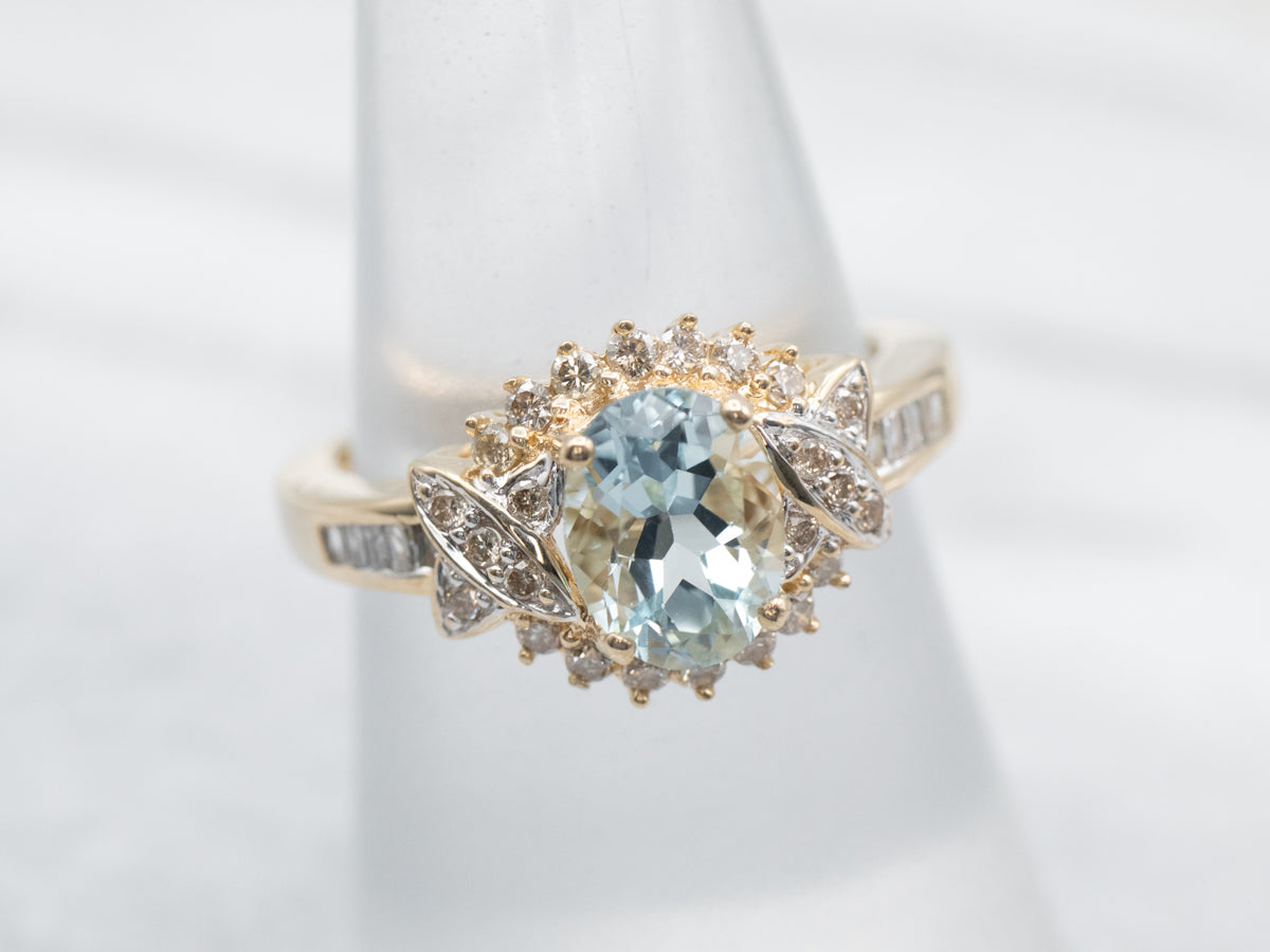 Modern Gold Aquamarine and Diamond Halo Ring
