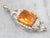 Glittering White Gold Fire Opal Pendant with Diamond Accents
