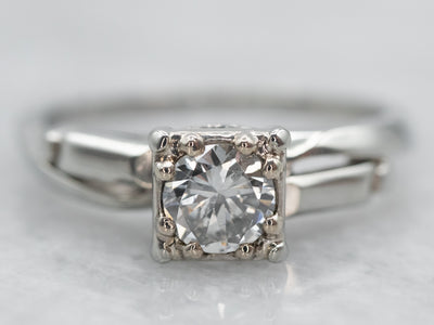 Interesting White Gold Diamond Solitaire Engagement Ring