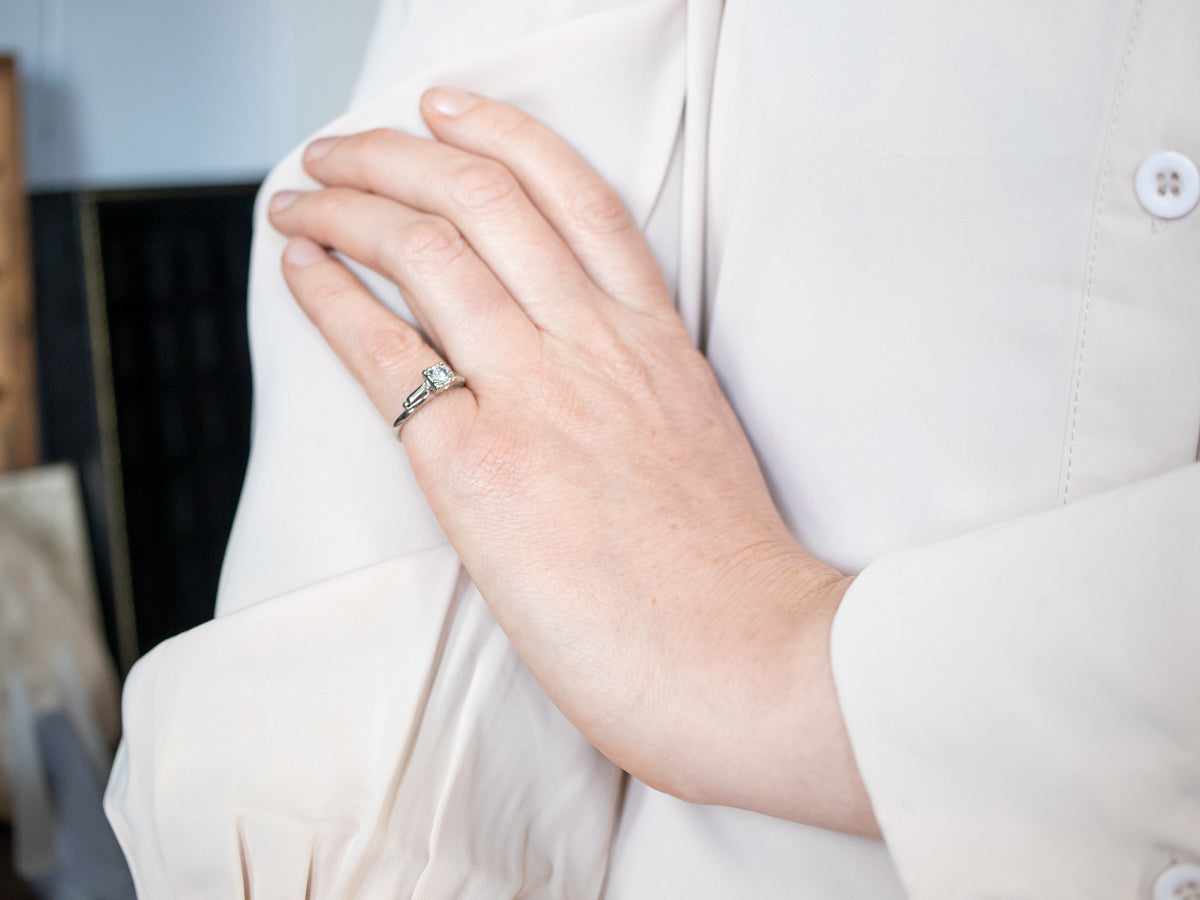 Interesting White Gold Diamond Solitaire Engagement Ring