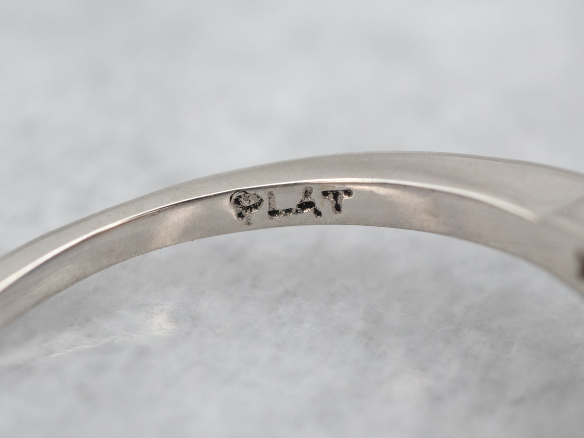 Platinum Sapphire Engagement Ring with Diamond Accents