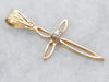 Simple Gold and Diamond Cross Pendant