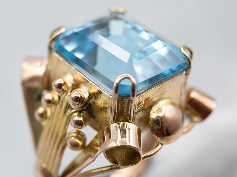 Sparkling Yellow Gold Blue Topaz Solitaire Cocktail Ring