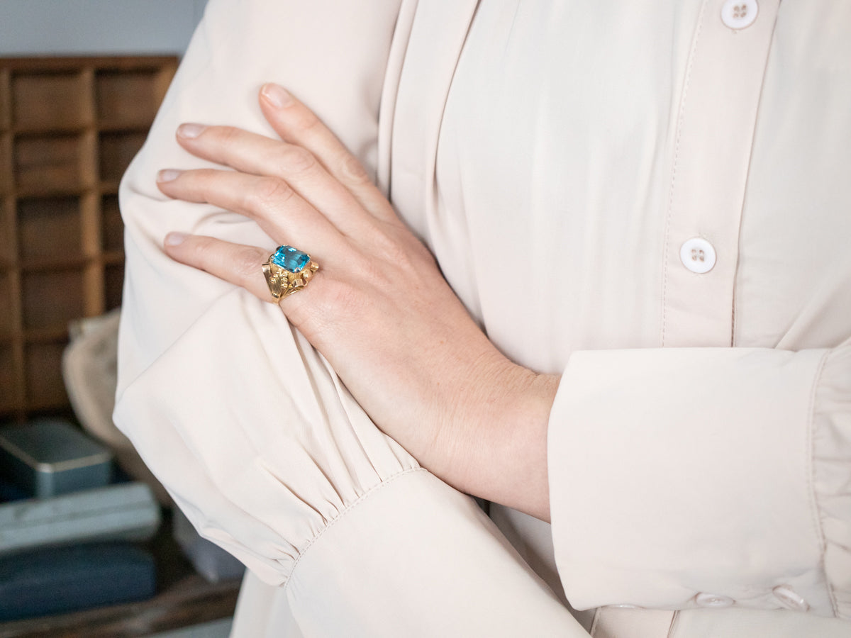 Sparkling Yellow Gold Blue Topaz Solitaire Cocktail Ring