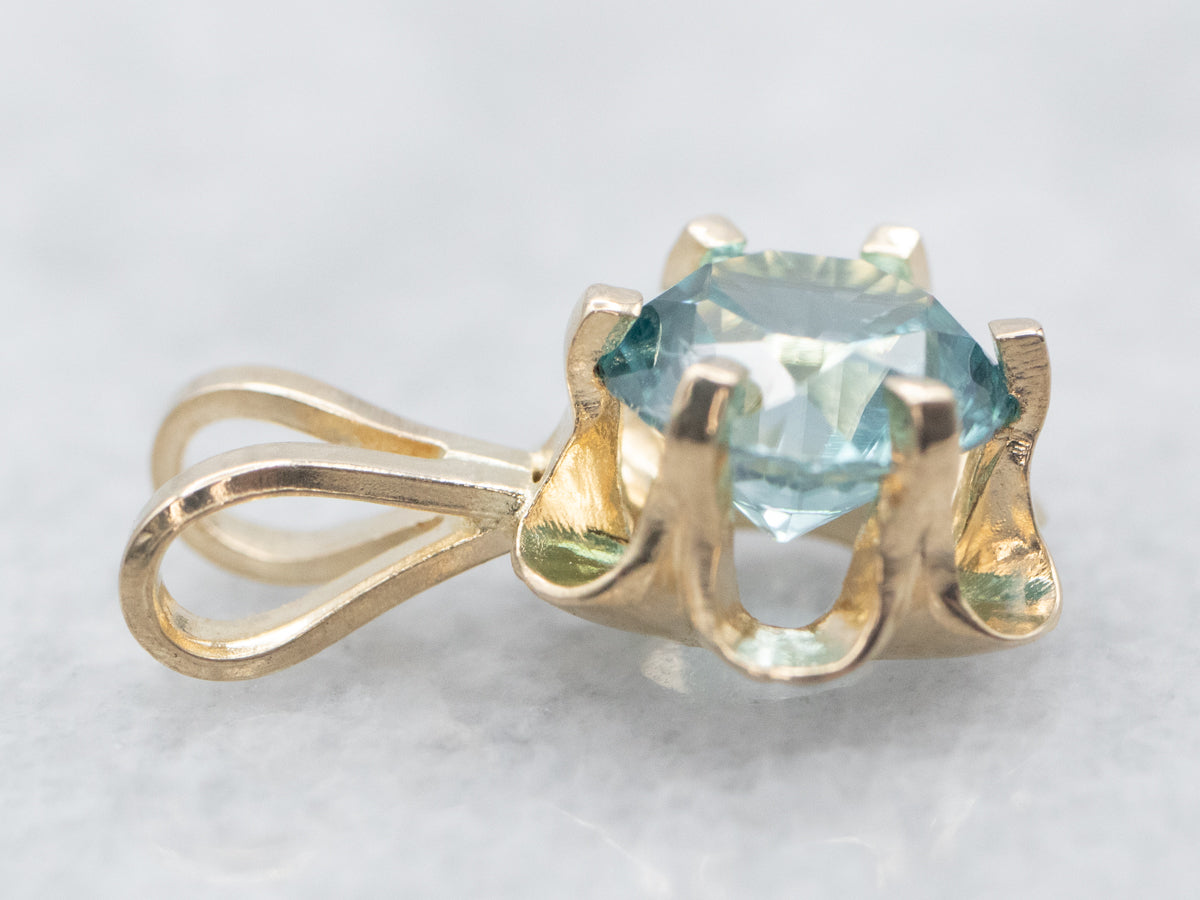 Colgante Solitario Botón de Oro Amarillo con Circonitas Azules