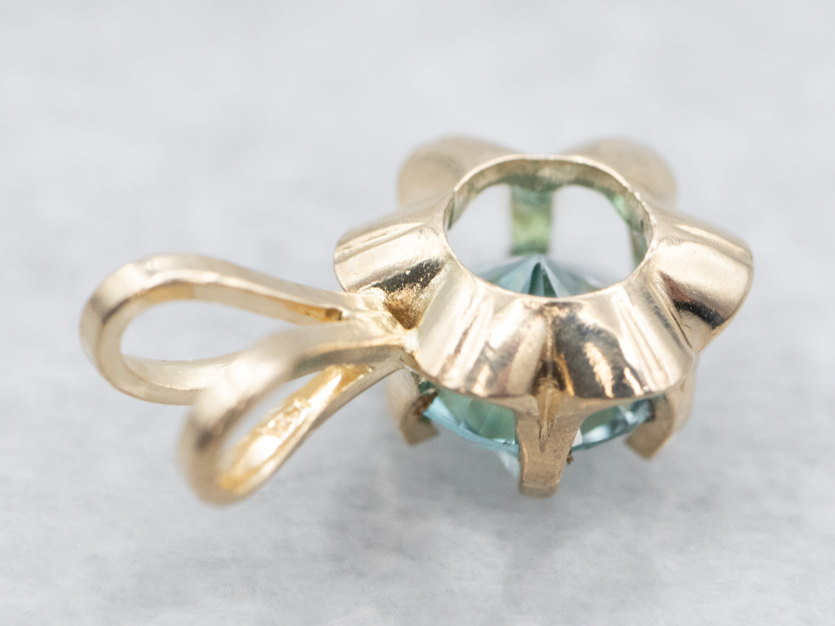 Colgante Solitario Botón de Oro Amarillo con Circonitas Azules