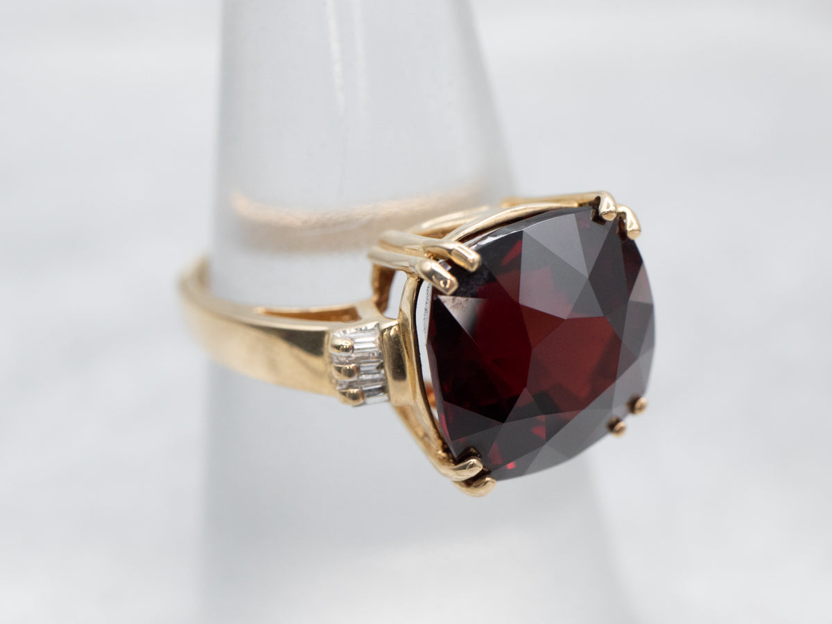Rich Yellow Gold Garnet Cocktail Ring with Baguette Diamond Accents