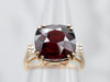 Rich Yellow Gold Garnet Cocktail Ring with Baguette Diamond Accents