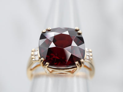 Rich Yellow Gold Garnet Cocktail Ring with Baguette Diamond Accents