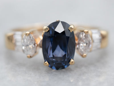 Modern Gold Sapphire Engagement Ring with Diamond Accents