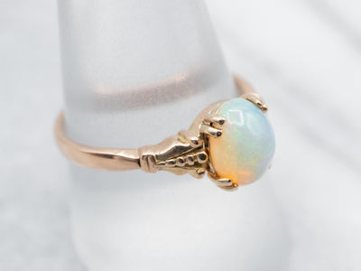 Sweet Yellow Gold Opal Solitaire Ring