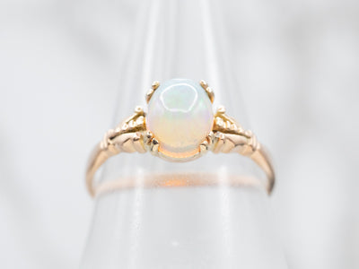 Sweet Yellow Gold Opal Solitaire Ring