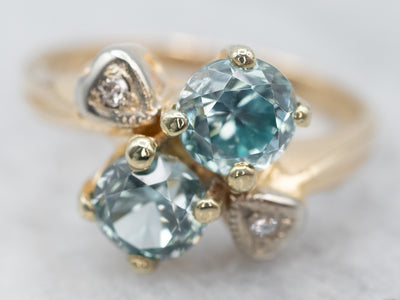 Lovely Gold Blue Zircon Bypass Ring with Diamond Accents