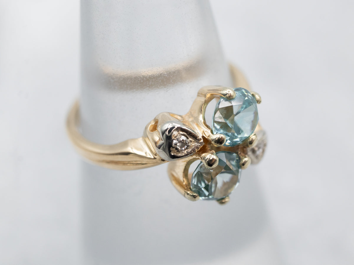 Lovely Gold Blue Zircon Bypass Ring with Diamond Accents