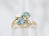 Lovely Gold Blue Zircon Bypass Ring with Diamond Accents