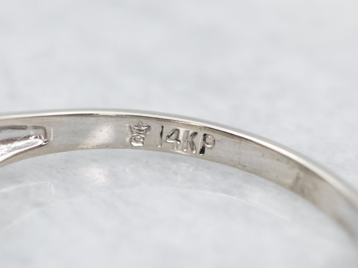 Alianza de boda de cinco diamantes en oro blanco