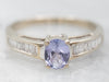 Striking White Gold Tanzanite Ring with Diamond Accents