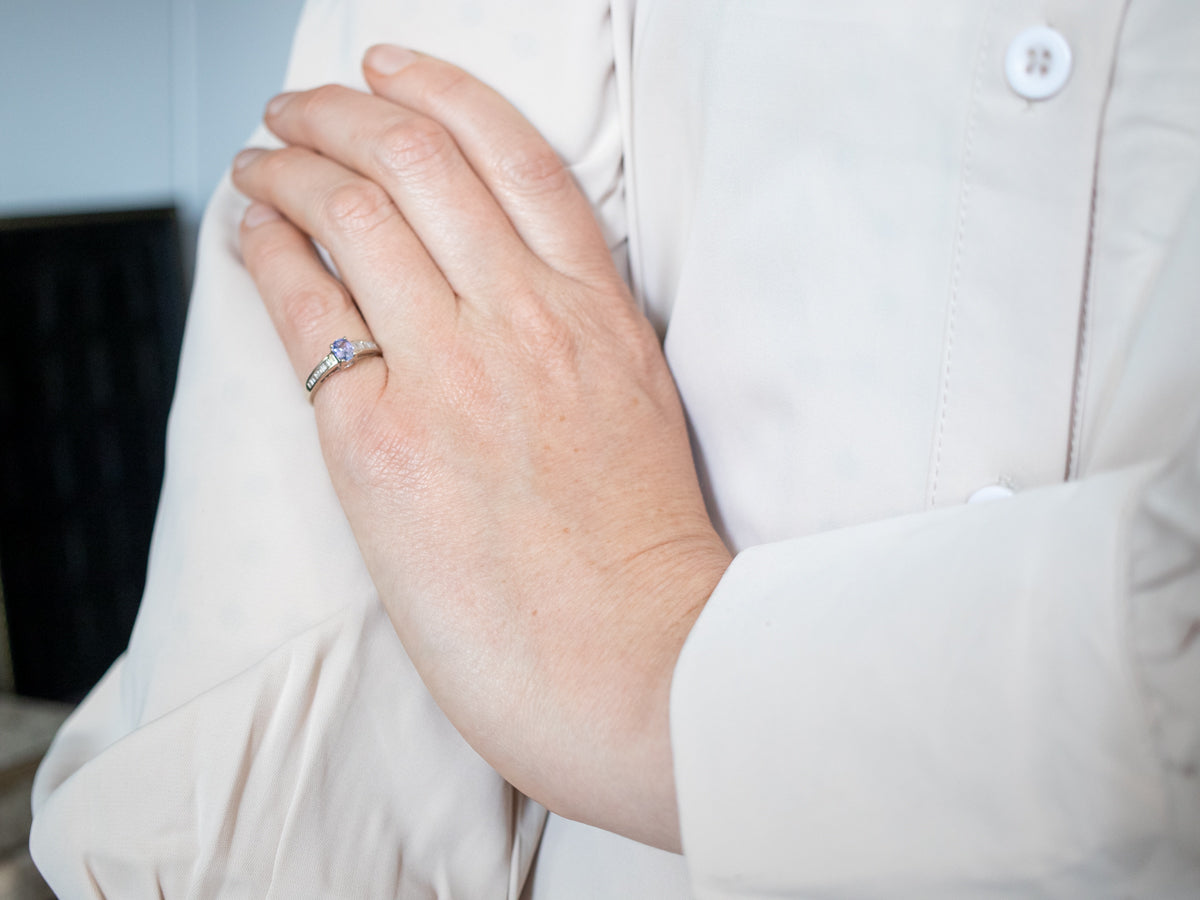 Striking White Gold Tanzanite Ring with Diamond Accents
