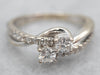 Modern Glittering Diamond Bypass Engagement Ring with Diamond Accents