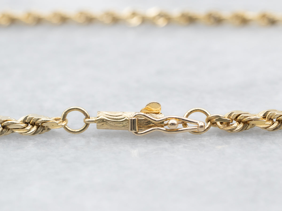 Cadena giratoria de cuerda de oro pulido con cierre de barril