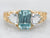 Yellow Gold Blue Zircon Ring with Aquamarine Accents