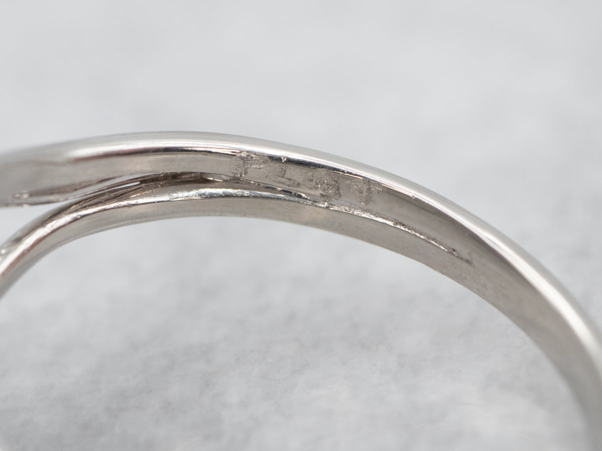 Incredible White Gold GASL Certified Sapphire Ring with a Halo of Diamond Accents