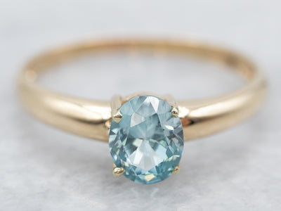 Timeless Yellow Gold Blue Zircon Solitaire Ring