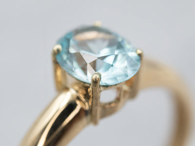 Timeless Yellow Gold Blue Zircon Solitaire Ring