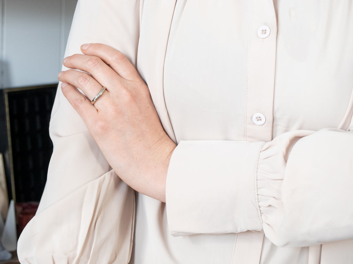 Gleaming  Curved Channel Set Diamond Enhancer Wedding Band