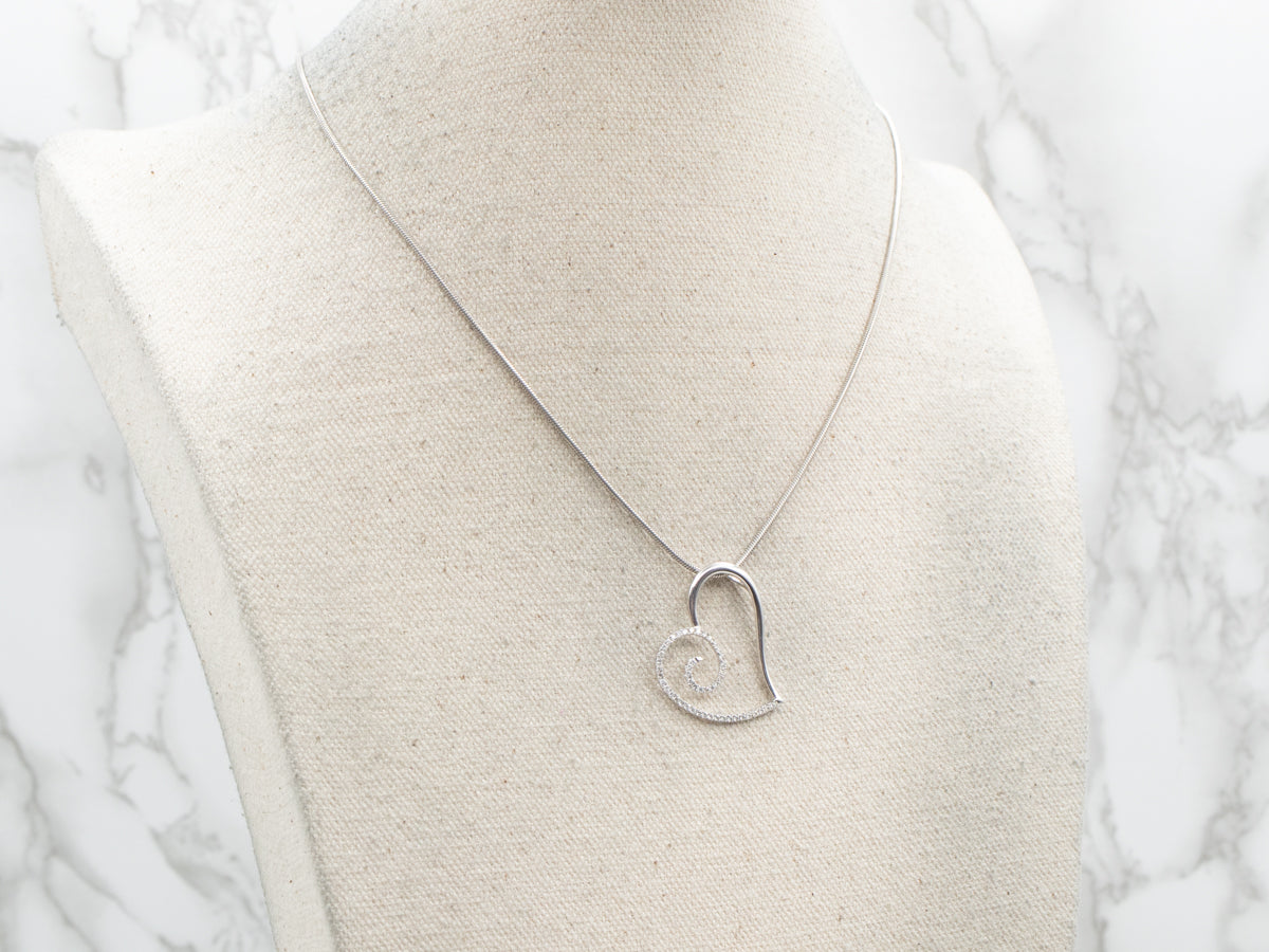 Swirling Modern Gold and Diamond Heart Pendant