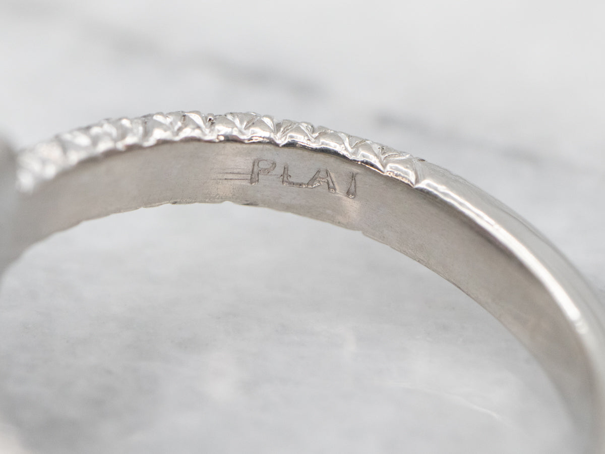 Modern Platinum Pink Sapphire and Diamond Halo Engagement Ring