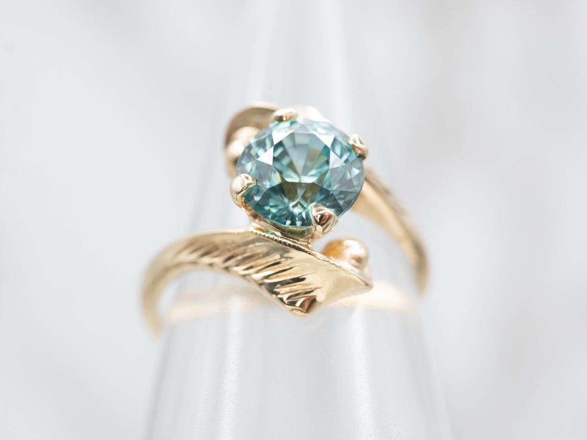 Stylish Gold Blue Zircon Solitaire Bypass Ring