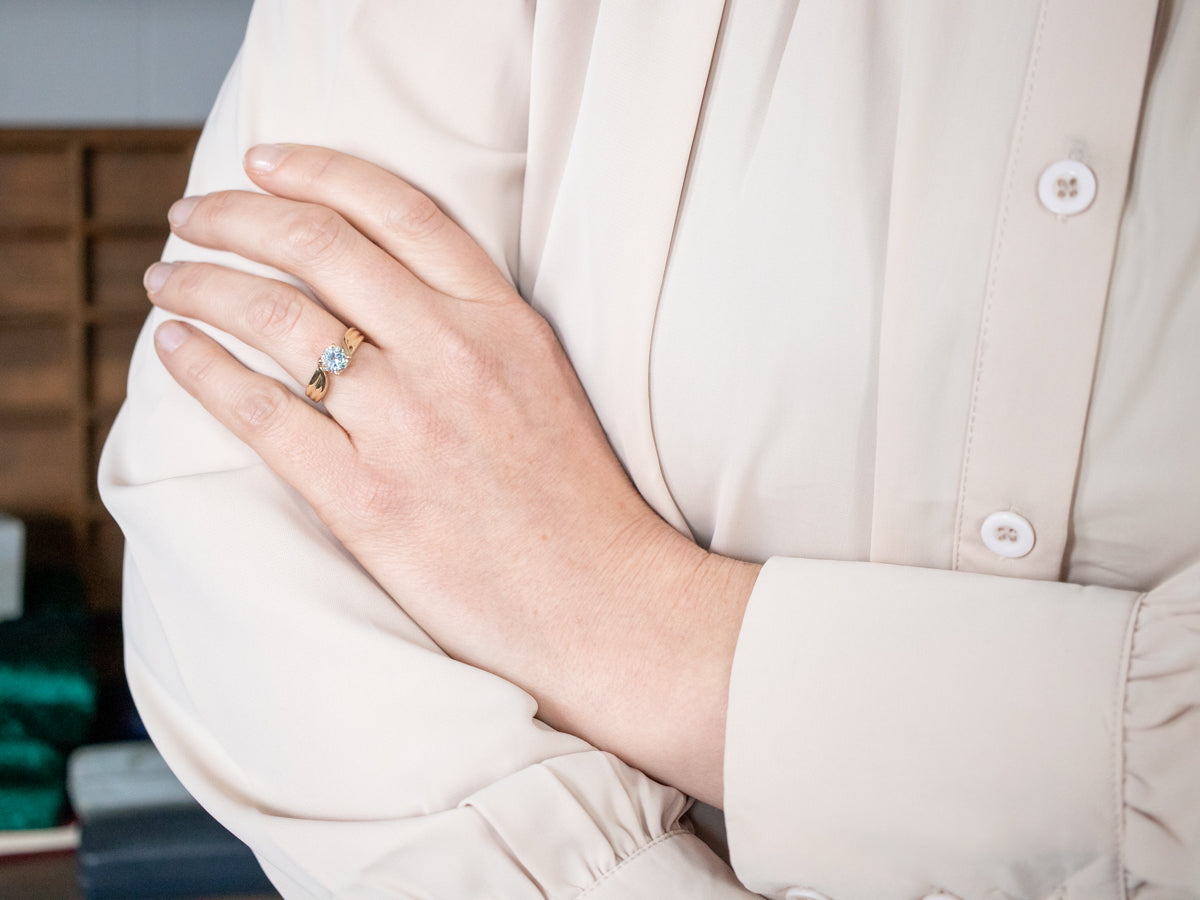 Polished Gold Blue Topaz Solitaire Bypass Ring