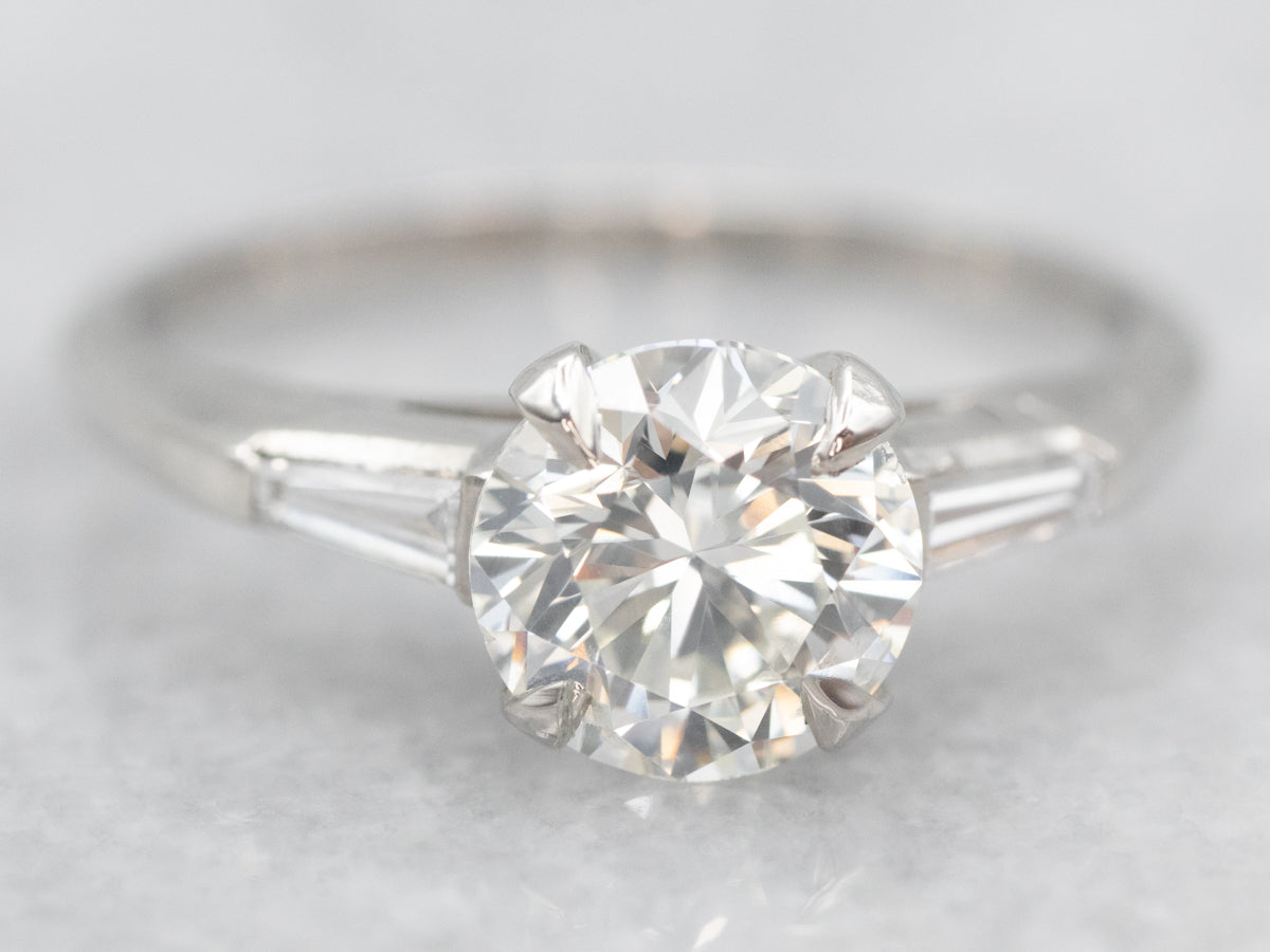 Platinum Diamond Engagement Ring with Baguette Diamond Accents