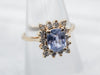 Yellow Gold Sapphire Engagement Ring with Diamond Halo