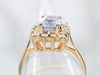 Yellow Gold Sapphire Engagement Ring with Diamond Halo