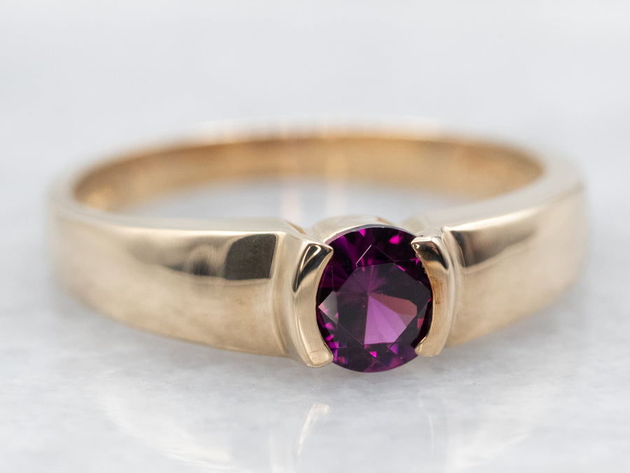 Yellow Gold Tension Set Garnet Solitaire Ring