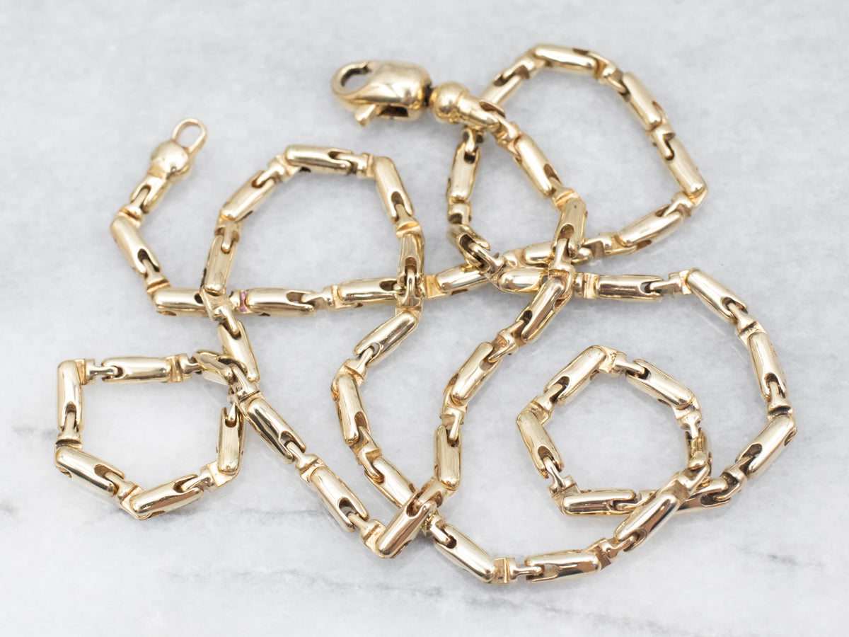 Cadena de Eslabones Tubulares de Oro Amarillo con Cierre Mosquetón