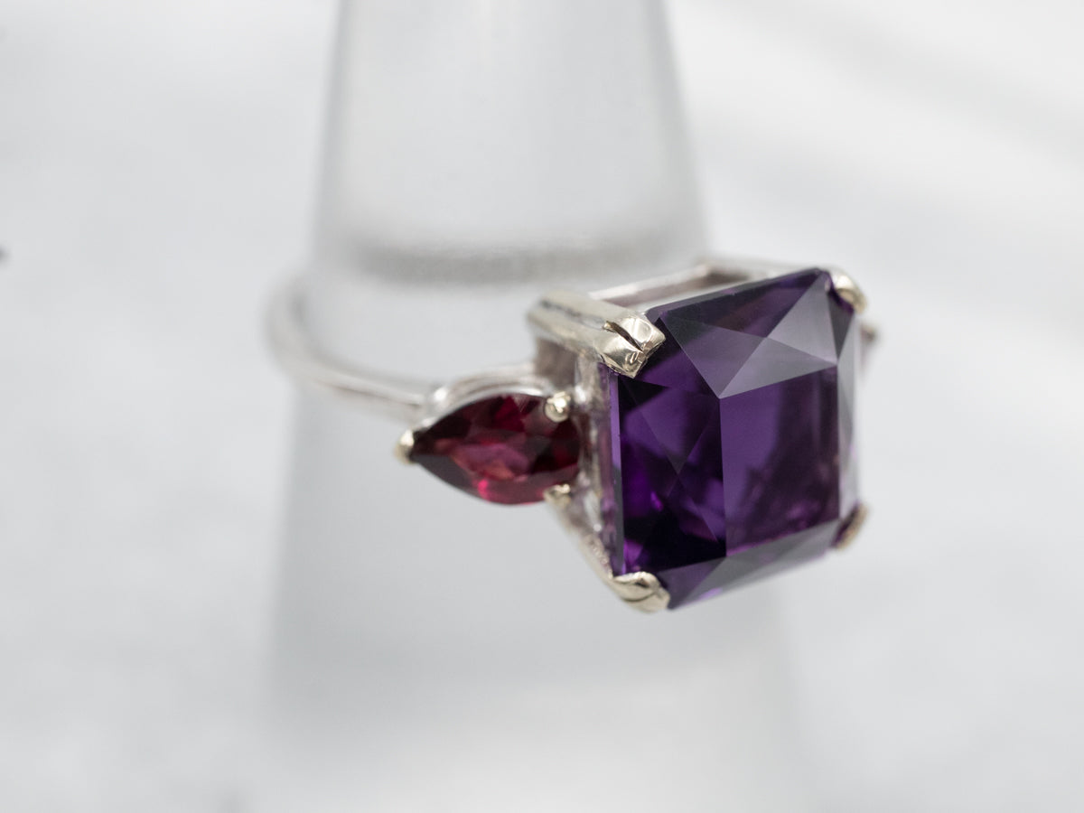 Expertly Crafted White Gold Amethyst Cocktail Ring with Garnet Accents