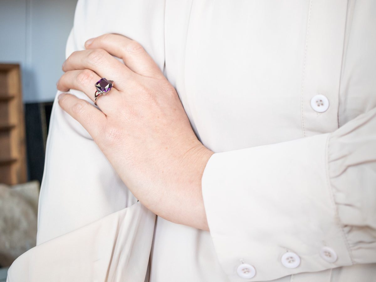 Expertly Crafted White Gold Amethyst Cocktail Ring with Garnet Accents