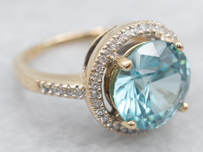 Stunning Blue Zircon and Diamond Halo Ring