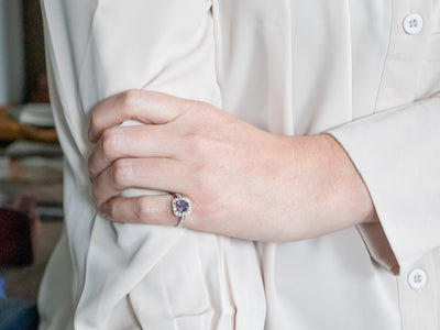 Contemporary Purple Sapphire and Diamond Halo Ring